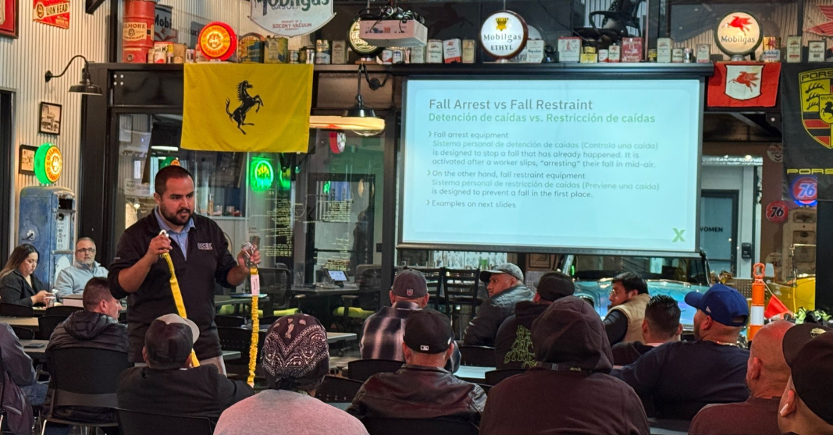 Mauricio leading a safety training workshop at Apex Headquarters.